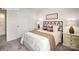 Cozy bedroom featuring neutral tones, comfortable bed, and an attached ensuite bathroom at 1044 Horizon Ln, Chester, SC 29706