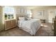 Comfortable bedroom featuring ample natural light and a cozy, inviting atmosphere and soft carpeting at 1044 Horizon Ln, Chester, SC 29706