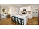 Bright kitchen boasts a quartz island with seating, stainless steel appliances, and open layout at 1044 Horizon Ln, Chester, SC 29706