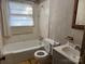 Bathroom with a bathtub, toilet, and vanity at 112 Greenwood Ave, Belmont, NC 28012