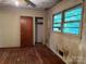Bedroom featuring hardwood floors, natural light, and neutral walls at 112 Greenwood Ave, Belmont, NC 28012