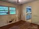 Hardwood floors and a view into the kitchen at 112 Greenwood Ave, Belmont, NC 28012