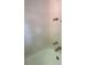 Plain tiled bathtub with starfish design hardware at 1121 Myrtle Ave # 58, Charlotte, NC 28203