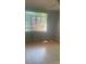 This bedroom with a ceiling fan features wood floors, and natural light with neutral paint to complement personal decor at 1121 Myrtle Ave # 58, Charlotte, NC 28203