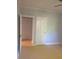 Light and airy bedroom with two doors, wood floors, ceiling fan, and neutral paint to complement personal decor at 1121 Myrtle Ave # 58, Charlotte, NC 28203