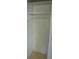 Bright white closet includes rod and shelf for storage solutions at 1121 Myrtle Ave # 58, Charlotte, NC 28203
