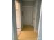 This entryway welcomes you with wood-look floors, neutral paint, and white door at 1121 Myrtle Ave # 58, Charlotte, NC 28203