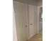 Hallway view showing two six-panel doors at 1121 Myrtle Ave # 58, Charlotte, NC 28203