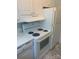 Cozy kitchen features marble counters and white appliances at 1121 Myrtle Ave # 58, Charlotte, NC 28203