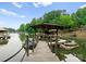 Private boat dock with covered boat slip and jet ski platforms for easy access to water activities and enjoyment at 116 Creeky Hollow Dr, Mooresville, NC 28117