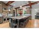 Well-appointed kitchen featuring a central island with seating, stainless steel appliances, and custom cabinetry at 116 Creeky Hollow Dr, Mooresville, NC 28117