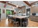 Spacious kitchen with a large island, bar stool seating, and stainless steel appliances at 116 Creeky Hollow Dr, Mooresville, NC 28117