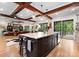 Spacious kitchen with a large island, granite countertops, stainless steel appliances, and an open layout at 116 Creeky Hollow Dr, Mooresville, NC 28117