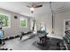 Home gym with exercise equipment, rubber flooring, and bright natural light at 116 Creeky Hollow Dr, Mooresville, NC 28117