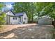 View of the backyard and detached garage of this charming home at 118 Cabarrus W Ave, Concord, NC 28025