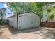 Spacious garage with room for vehicles, storage, and outdoor equipment at 118 Cabarrus W Ave, Concord, NC 28025