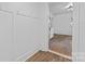 Bright hallway features new flooring, fresh paint and leads into other rooms at 118 Cabarrus W Ave, Concord, NC 28025