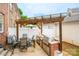 Outdoor patio with a grill, table, and chairs perfect for outdoor dining and entertaining at 123 Singleton Rd, Mooresville, NC 28117