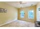 Bedroom with carpet, two windows, and neutral paint at 123 Singleton Rd, Mooresville, NC 28117