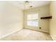 Bedroom with neutral walls, carpet, and a window providing natural light at 123 Singleton Rd, Mooresville, NC 28117