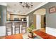Cozy dining area featuring a kitchen bar with seating and an open layout to the kitchen at 123 Singleton Rd, Mooresville, NC 28117
