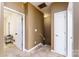 Entry hall featuring neutral walls, a staircase, and white painted trim at 123 Singleton Rd, Mooresville, NC 28117