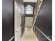 View of the home's entryway with a hardwood floor, a staircase, and a hanging chandelier at 15313 Moate Ct, Huntersville, NC 28078