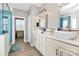 Well-lit bathroom featuring double sinks, quartz countertops, and modern fixtures at 1618 Bay Meadows Nw Ave, Concord, NC 28027