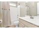 Bathroom boasts a shower-tub combination, vanity, and neutral finishes at 1618 Bay Meadows Nw Ave, Concord, NC 28027