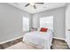 Cozy bedroom with wood floors and ceiling fan at 1618 Bay Meadows Nw Ave, Concord, NC 28027