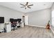 Bright bedroom with hardwood floors and ceiling fan at 1618 Bay Meadows Nw Ave, Concord, NC 28027