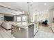 Open kitchen boasts a large island, stainless steel appliances, and breakfast nook at 1618 Bay Meadows Nw Ave, Concord, NC 28027