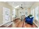 Sunroom offers a vaulted ceiling, skylight, and abundance of natural light from large windows at 1618 Bay Meadows Nw Ave, Concord, NC 28027
