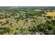 Aerial view of the property showcasing its location within a neighborhood surrounded by trees at 170 Wagon Wheel Way # 4, Salisbury, NC 28147
