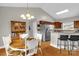 Dining area situated next to the kitchen, featuring a dining table, chairs, and built-in cabinet at 170 Wagon Wheel Way # 4, Salisbury, NC 28147