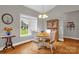 Cozy dining area with wood table, chairs, and natural light from the window overlooking the backyard at 170 Wagon Wheel Way # 4, Salisbury, NC 28147