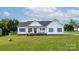 Charming single-story home with a welcoming front porch and well-manicured lawn at 170 Wagon Wheel Way # 4, Salisbury, NC 28147