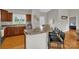 Kitchen bar with seating, granite countertop, and wood cabinets. Perfect for casual dining and entertaining at 170 Wagon Wheel Way # 4, Salisbury, NC 28147