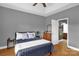 Comfortable main bedroom with a queen-size bed, dresser, and ensuite bathroom access at 170 Wagon Wheel Way # 4, Salisbury, NC 28147
