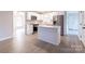 Bright, updated kitchen with white cabinets, stainless steel appliances, and a functional island at 1770 Windsor Dr, Lancaster, SC 29720