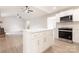 Modern open kitchen with white cabinetry, an island with quartz countertop, and stainless steel appliances at 1770 Windsor Dr, Lancaster, SC 29720