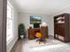 Home office featuring wood furniture, decor, and window for natural light at 1770 Windsor Dr, Lancaster, SC 29720