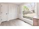 Bright room with a large window, featuring a serene view of the backyard at 1770 Windsor Dr, Lancaster, SC 29720