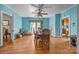 Bright dining room with hardwood floors and a large window, adjacent to the kitchen at 18070 Old Beatty Ford Rd, Gold Hill, NC 28071