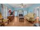 Charming living room features hardwood floors and a classic fireplace, creating a cozy atmosphere at 18070 Old Beatty Ford Rd, Gold Hill, NC 28071