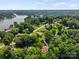 Community aerial view showcasing lake access, lush greenery, and well-maintained residential streets at 2045 10Th Street Nw Ln, Hickory, NC 28601