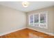 Comfortable bedroom featuring hardwood floors, ample natural light, and a neutral color palette at 2045 10Th Street Nw Ln, Hickory, NC 28601