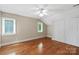 Bright bedroom with hardwood floors, large windows, and ample closet space at 2045 10Th Street Nw Ln, Hickory, NC 28601
