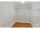 Walk-in closet featuring built-in shelving and ample storage space at 2045 10Th Street Nw Ln, Hickory, NC 28601