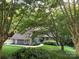 Charming home with wood siding, manicured lawn, and mature trees offering great shade at 2045 10Th Street Nw Ln, Hickory, NC 28601